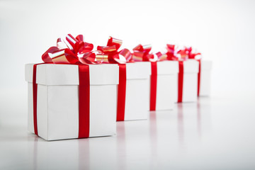 white gift boxes on gray