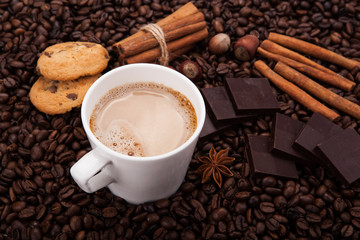 coffee beans coffee with cream in a cup