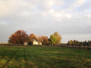 fall sunrise with barn