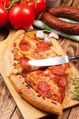 Two pieces of pizza.