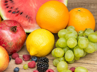 Watermelon, Pomegranate, Oranges, Lemons, Grapes And Berries