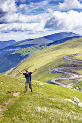 Fototapeta premium Man hiking into the mountains