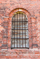 Fototapeta na wymiar Window in an old brick church