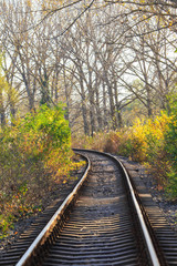 Fototapeta na wymiar Scenic railroad in autumn in remote rural area