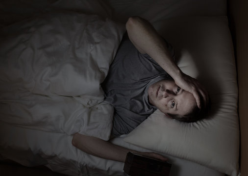 Mature man cannot fall asleep during night time