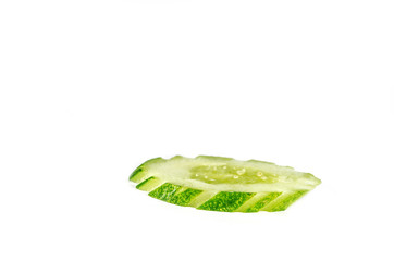 sliced cucumber isolated on white background