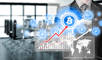 Choosing bitcoins, businessman pressing touch screen button.