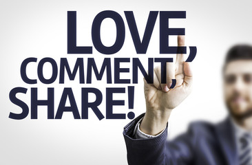 Business man pointing the text: Love, Comment, Share!
