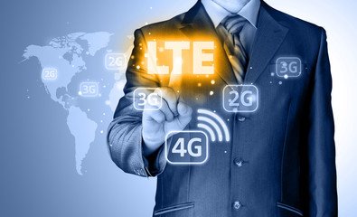 businessman is pushing his finger on lte button