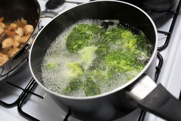Broccoli boiling in a pot