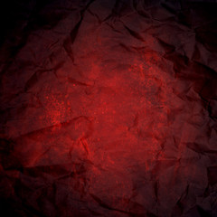 red abstract wrinkled paper texture or background