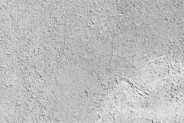 Gray wall with stucco. Photo background texture