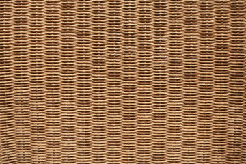 Brown wicker furniture surface. Background photo texture