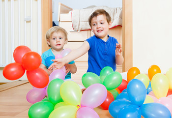 Fototapeta na wymiar Children with balloons .