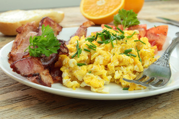 Breakfast with scrambled eggs and bacon