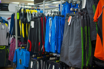Sports bright shorts on stand in store
