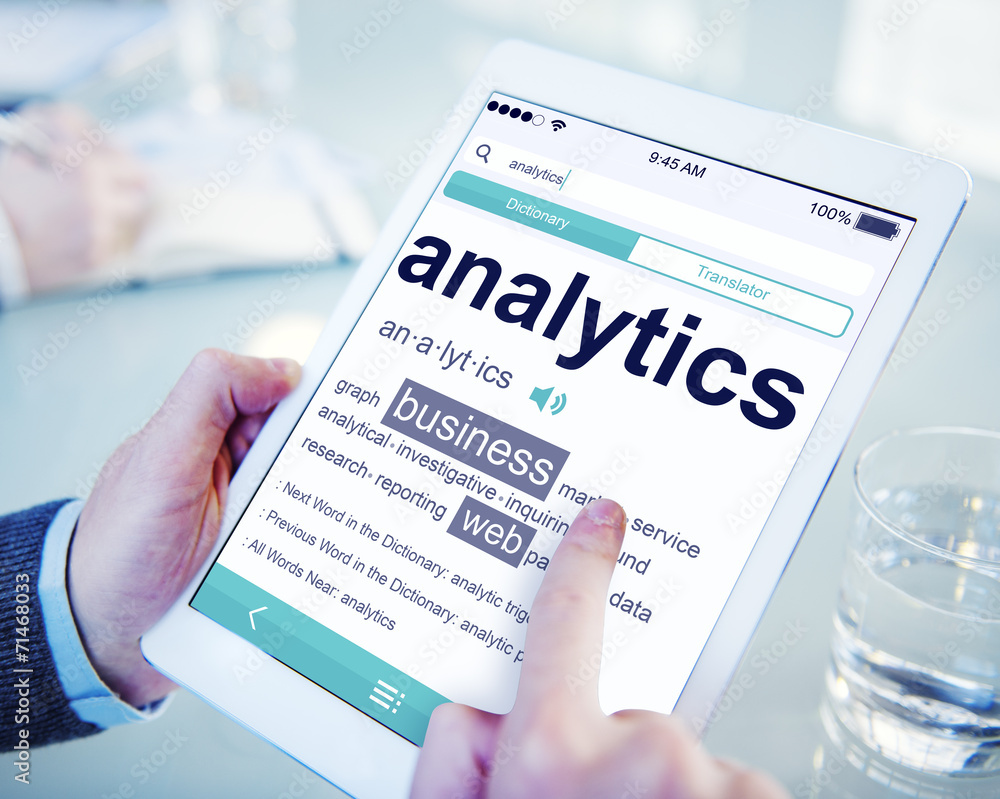 Poster man reading the definition of analytics