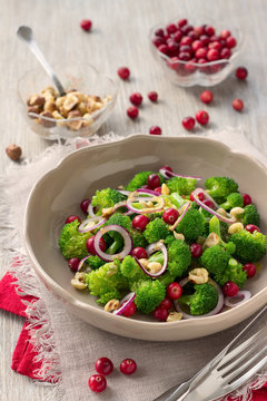 Broccoli salad with fresh cranberries, nuts and mustard dressing