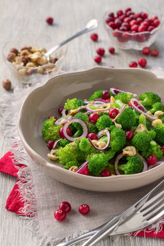 Broccoli salad with fresh cranberries, nuts and mustard dressing
