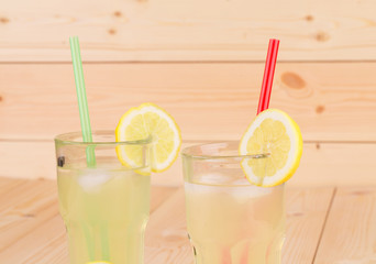 Three collins full of tasty cold lemonade.