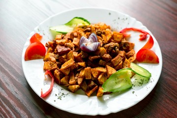 Delicious food on white plate