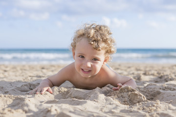 child in the sand
