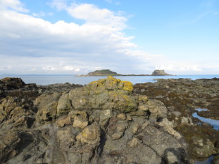 Fototapeta na wymiar Rocks overlooking Fidra Island