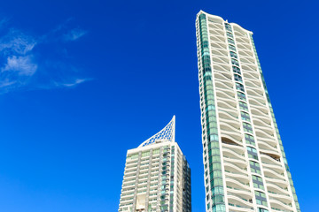 Fototapeta na wymiar Two skyscrapers and blue sky