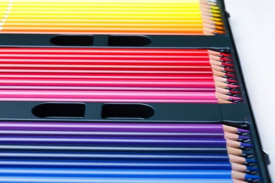 Color pencils in box, shallow dof