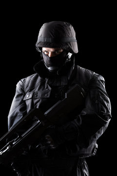 Spec ops soldier on black background