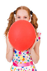 Young woman with red balloon isolated on white