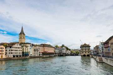Fototapeta na wymiar Limmat river and famous Zurich churches