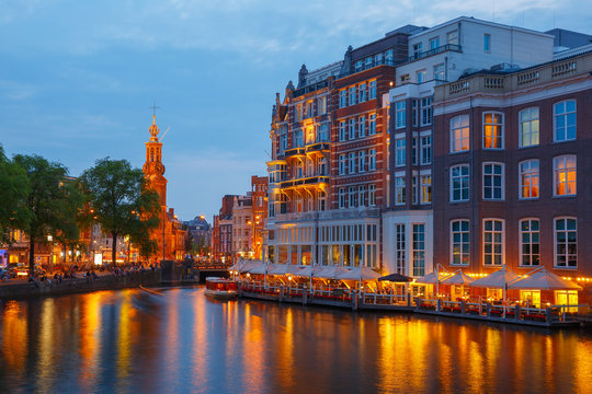 Night city view of Amsterdam canal,  and bridge