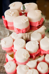 beautifully decorated wedding cupcakes on a plate, Cake