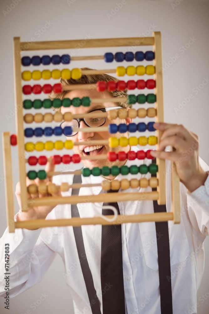 Aufkleber geeky businessman using an abacus