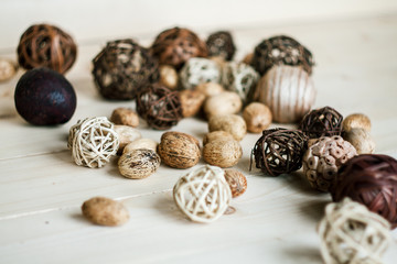 Brown rattan balls on old wooden background