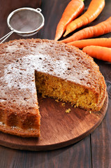 Carrot pie and on wooden table