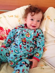 Baby boy smiling after just waking up