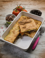 focaccia stuffed with black olives tomatoes and anchovies