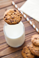 chocolate cookies and milk in jar