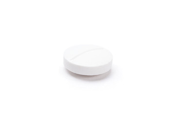 White round tablet, isolated. Healthcare concept
