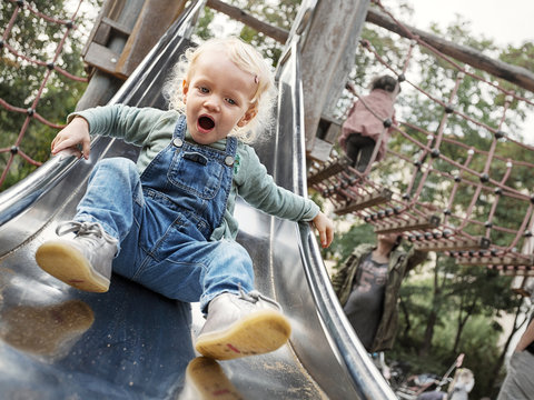 Little girl on the slide