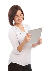 Smiling woman reading on an electronic tablet