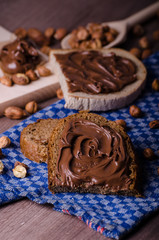 Fototapeta na wymiar Healthy bread with Chocolate spread and nuts