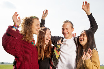 Group of young people at the waving