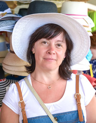 happy woman in a hat