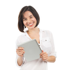 Smiling young brunette holding a touchpad