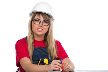 Young woman construction worker isolated on white