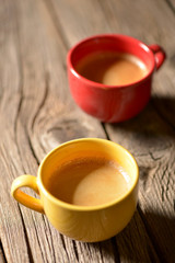 Coffee in a cup on a wooden table