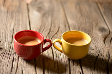 Coffee in a cup on a wooden table